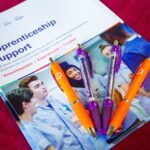 Apprenticeship support booklet with pens